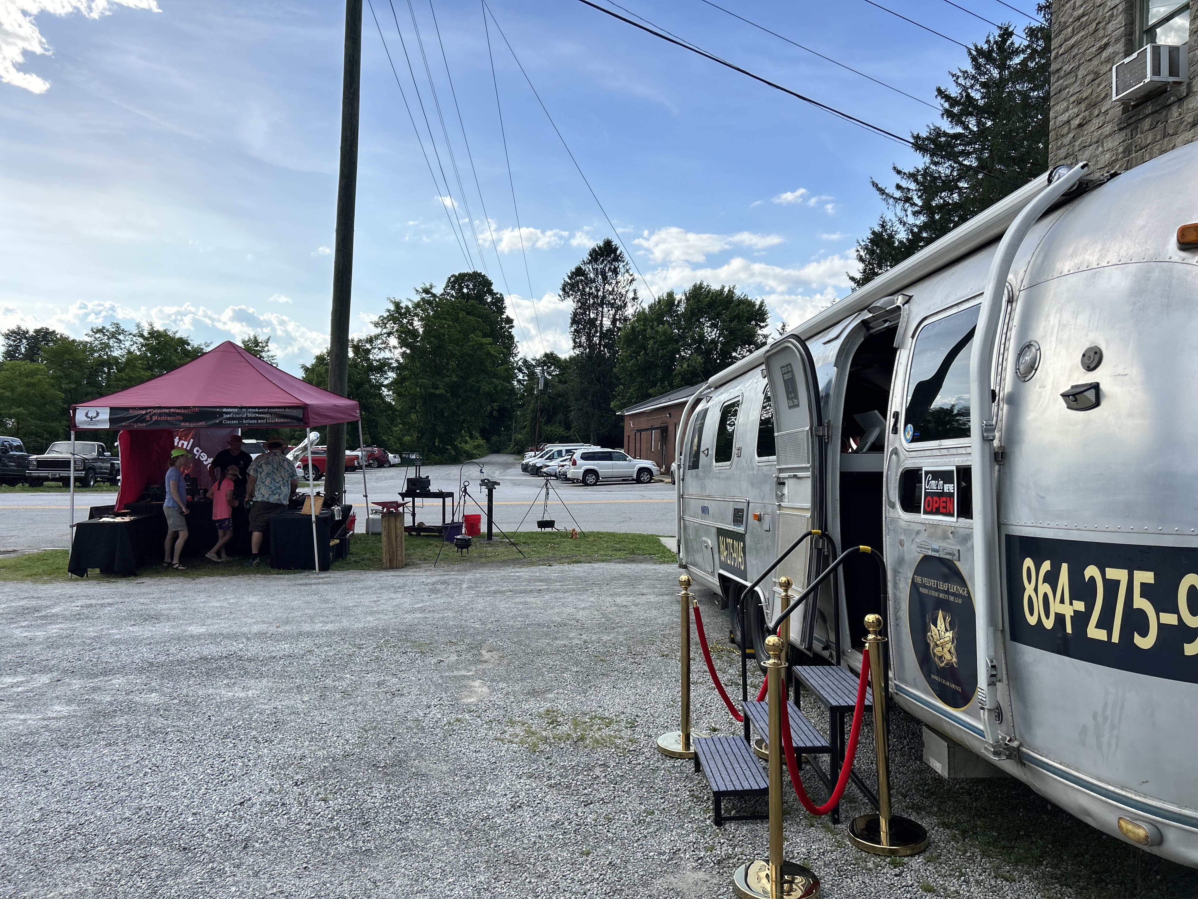 The Velvet Leaf Airstream parked outside at a community event