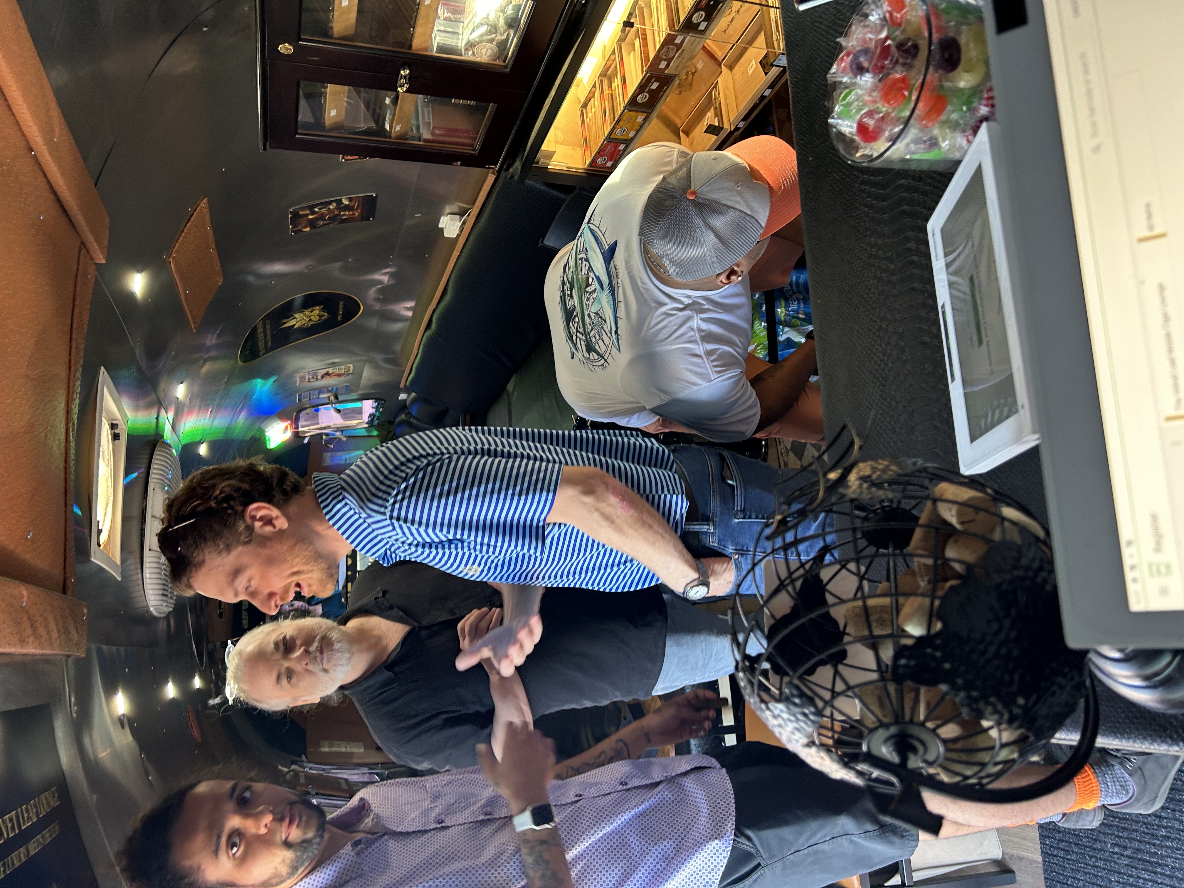 Guests gathered around the lounge's cigar humidor